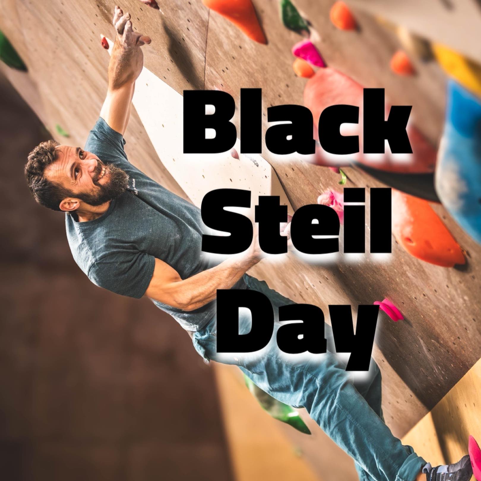 Ein Mann klettert an einer Wand mit der Überschrift Black Steil Day.